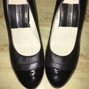 Nine West sz10 wedge heel genuine patent leather and leather shaft.